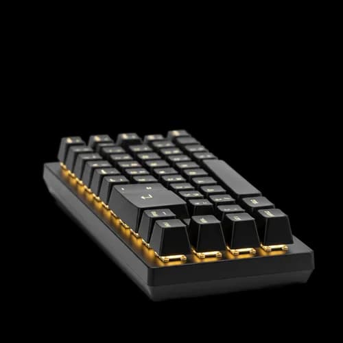 Black mechanical computer keyboard with gold keys