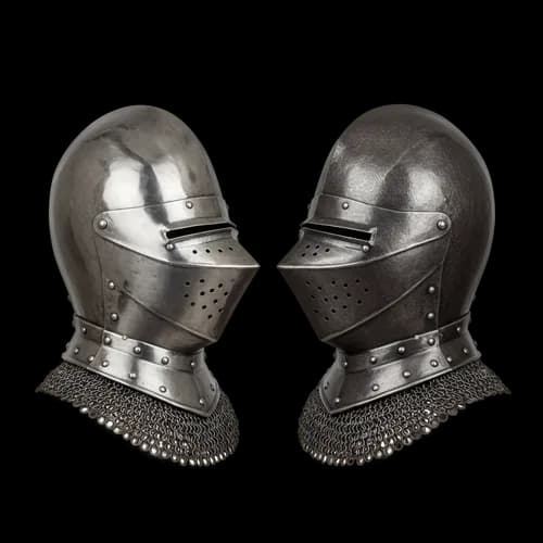 Two medieval knight helmets with metal chain mail