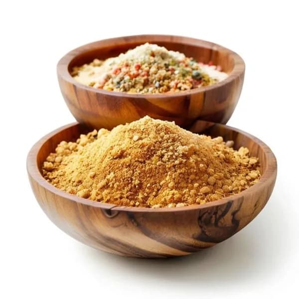 Composición Minimalista de Curry en Polvo y Entero en Cuenco de Madera