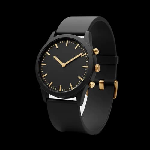 Elegant black wrist watch with gold hands and markers
