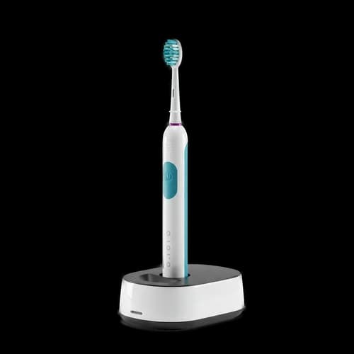 Cepillo de dientes eléctrico moderno en base de carga descarga gratuita