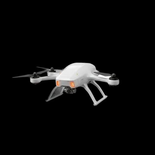 Modern white quadcopter drone flying in the air