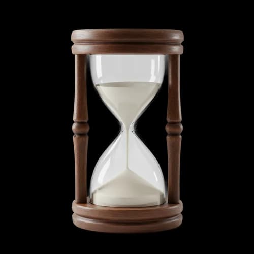Classic wooden hourglass with flowing white sand